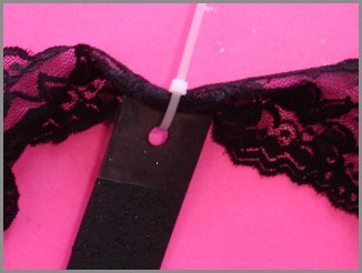 Image: Foam strip attached to lace with a zip tie