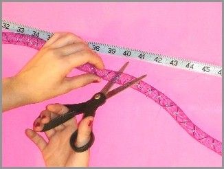 Image: Cutting cyberlox alongside the measuring tape